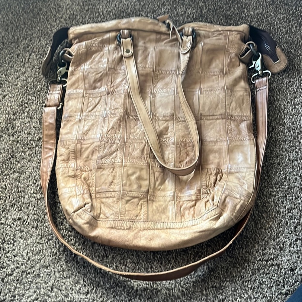 Free People leather tan bag, used but in good shape. Priced low to sell.